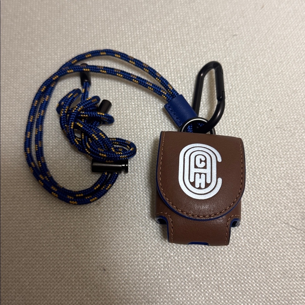 NWOT, Coach vintage retro “C” earpods  leather case.